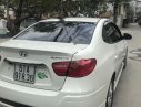 Hyundai Avante 2.0 2014 - Cần bán xe Hyundai Avante 2.0 sản xuất 2014, màu trắng xe gia đình 