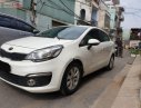 Kia Rio 2016 - Gia đình bán Kia Rio sản xuất 2016, màu trắng, xe nhập