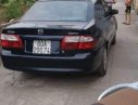 Mazda 626 2001 - Cần bán lại xe Mazda 626 đời 2001, màu đen, nhập khẩu nguyên chiếc xe gia đình