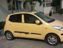 Hyundai i10   2010 - Bán ô tô Hyundai i10 đời 2010, màu vàng, đi được khoảng 86.000km