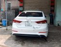 Hyundai Elantra 1.6 AT 2016 - Cần bán xe Hyundai Elantra 1.6 AT năm 2016, màu trắng đã đi 60000 km