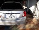 Chevrolet Lacetti   2010 - Cần bán xe Chevrolet Lacetti đời 2010, màu bạc xe gia đình