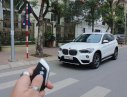 BMW X1 18i 2018 - Cần bán BMW X1 18i đời 2019, màu trắng, xe nhập