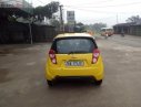 Chevrolet Spark LT 1.0 MT 2015 - Cần bán xe Chevrolet Spark LT 1.0 MT đời 2015, màu vàng 