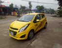 Chevrolet Spark LT 1.0 MT 2015 - Cần bán xe Chevrolet Spark LT 1.0 MT đời 2015, màu vàng 