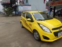 Chevrolet Spark LT 1.0 MT 2015 - Cần bán xe Chevrolet Spark LT 1.0 MT đời 2015, màu vàng 