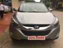 Hyundai Tucson 2.0 AT 2010 - Cần bán Hyundai Tucson đời 2010, màu xám (ghi), giá 550 tr