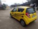 Chevrolet Spark LT 1.0 MT 2015 - Cần bán xe Chevrolet Spark LT 1.0 MT đời 2015, màu vàng 