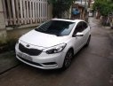 Kia K3 2.0 2014 - Bán Kia K3 2.0 sản xuất năm 2014, màu trắng giá cạnh tranh