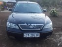 Ford Mondeo 2.5 AT 2003 - Cần bán lại xe cũ Ford Mondeo 2.5 AT năm 2003, màu đen