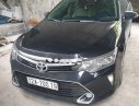 Toyota Camry 2.0E 2018 - Bán gấp Toyota Camry 2.0E sản xuất năm 2018, màu đen, xe gia đình 