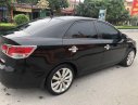 Kia Cerato AT 2009 - Cần bán Kia Cerato AT sản xuất 2009, màu đen, nhập khẩu