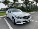 Mercedes-Benz E class E200 2014 - Bán xe Mercedes E200 trắng 2014 cũ chính hãng. Trả trước 400 triệu nhận xe ngay