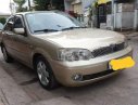 Ford Laser   2003 - Cần bán Ford Laser đời 2003, màu vàng, số sàn