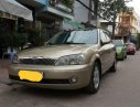 Ford Laser   2003 - Cần bán Ford Laser đời 2003, màu vàng, số sàn