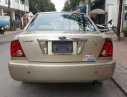 Ford Laser   2003 - Cần bán Ford Laser đời 2003, màu vàng, số sàn