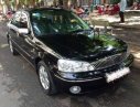 Ford Laser  Ghi 1.8   2011 - Bán xe Ford Laser Ghi 1.8 2011, màu đen, xe gia đình 
