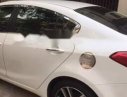 Kia K3   2.0AT 2016 - Cần bán gấp Kia K3 2.0AT đời 2016, màu trắng, nhập khẩu  