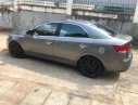 Kia Forte 2011 - Cần bán gấp Kia Forte sản xuất năm 2011, màu xám 