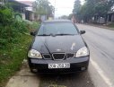 Daewoo Lacetti   2004 - Cần bán xe Daewoo Lacetti 2004, màu đen