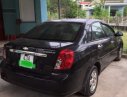 Chevrolet Lacetti 2013 - Bán xe Chevrolet Lacetti sản xuất 2013, màu đen còn mới, giá chỉ 250 triệu