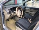 Nissan Grand livina 1.8 MT 2011 - Cần bán lại xe cũ Nissan Grand livina 1.8 MT đời 2011, màu bạc, xe gia đình