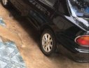 Mazda 323   2000 - Bán xe Mazda 323 2000, màu đen, xe nhập, 140tr