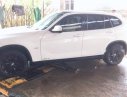 BMW X1 2010 - Cần bán xe BMW X1 2010, màu trắng xe gia đình