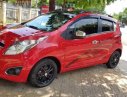 Chevrolet Spark LTZ   2013 - Bán Chevrolet Spark LTZ đời 2013, màu đỏ, số tự động 