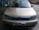 Ford Laser 2003 - Bán xe Ford Laser năm 2003, màu vàng, giá 205tr