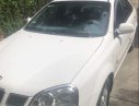 Daewoo Lacetti  MT 2004 - Bán ô tô Daewoo Lacetti MT sản xuất năm 2004, màu trắng, nội thất zin nguyên bản