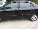 Toyota Corolla altis MT 2005 - Cần bán xe Toyota Corolla altis sản xuất 2005, màu đen 