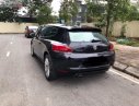 Volkswagen Scirocco 1.4 AT 2010 - Bán xe Volkswagen Scirocco đời 2010, đăng ký cuối năm 2011, xe màu đen, nội thất màu da bò