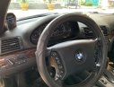 BMW 3 Series 325i 2005 - Bán xe BMW 325i sản xuất năm 2005, màu đen, xe nhập, 265tr