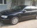 Ford Mondeo   2004 - Cần bán lại xe Ford Mondeo 2004, màu đen, máy êm, điều hòa rét run