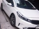 Kia Cerato  AT 2016 - Bán ô tô Kia Cerato AT sản xuất năm 2016, màu trắng xe gia đình