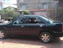 Ford Laser GHIA 1.8 MT 2003 - Gia đình bán Ford Laser GHIA 1.8 MT đời 2003, màu đen