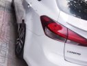 Kia Cerato  AT 2016 - Bán ô tô Kia Cerato AT sản xuất năm 2016, màu trắng xe gia đình