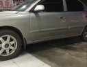 Kia Spectra 2004 - Cần bán gấp Kia Spectra 2004, màu bạc, giá tốt