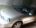 Ford Laser 2003 - Cần bán lại xe Ford Laser năm 2003, màu vàng, giá tốt