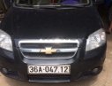 Chevrolet Aveo 1.5MT 2013 - Bán xe Chevrolet Aveo 1.5MT đời 2013, màu đen, xe như mới