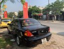 Kia Spectra 2004 - Cần bán lại xe Kia Spectra năm sản xuất 2004, màu đen giá cạnh tranh