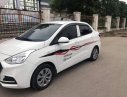 Hyundai Grand i10 1.2MT 2018 - Bán xe Hyundai Grand i10 Sedan 1.2, số sàn, mâm sắt, sản xuất 2018 màu trắng tinh