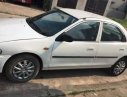 Mazda 323 2000 - Cần bán Mazda 323 đời 2000, màu trắng