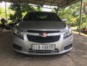 Chevrolet Cruze MT 2011 - Bán Chevrolet Cruze MT năm 2011, màu bạc xe gia đình