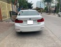 BMW 3 Series 320i 2014 - Cần bán xe BMW 320i 2014 ĐK 2015, số tự động màu trắng