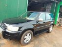 Ford Escape 3.0 AT 2004 - Bán Ford Escape 3.0 AT đời 2004, màu đen, xe nhập xe gia đình