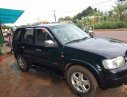 Ford Escape 3.0 AT 2004 - Bán Ford Escape 3.0 AT đời 2004, màu đen, xe nhập xe gia đình