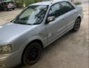 Ford Laser  1.8 Ghia 2003 - Bán xe Ford Laser 1.8 Ghia 2003, màu xám số sàn, giá 165tr