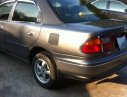Mazda 323  MT 1998 - Bán xe Mazda 323 5 chỗ, số sàn, màu lông chuột